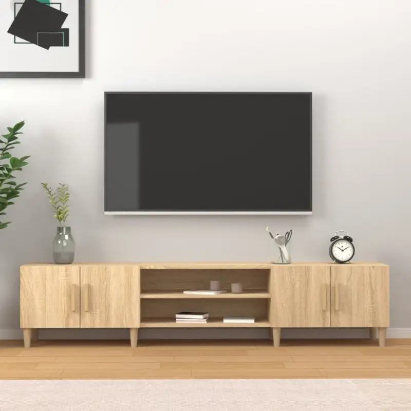 Moderne tv-meubel met bewerkt hout en houten poten voor strak interieur - Tv-meubels