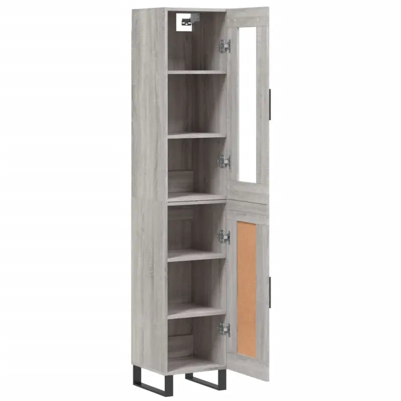 Hoge kast met ijzeren poten en bewerkt hout voor een trendy interieur - Dressoirs & buffetkasten
