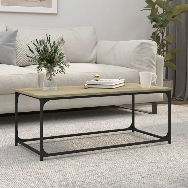 Klassieke salontafel met bewerkt hout en ijzeren frame voor elegantie - Salontafels