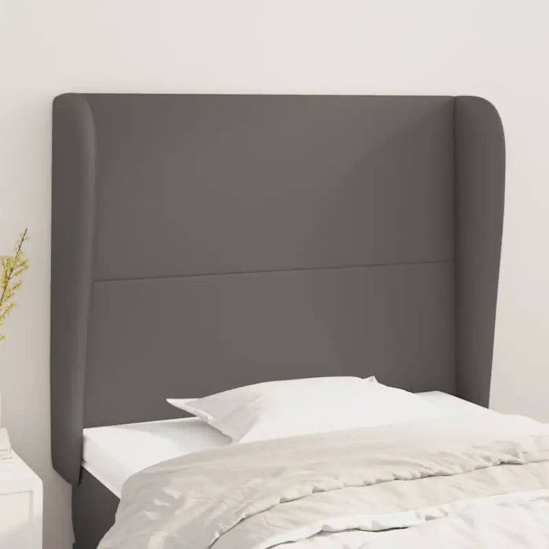 Leverting bevat een klassiek hoofdbord met trendy ontwerp in glanzend kunstleer - Grijs / 83 x 23 x 118/128 cm / 1