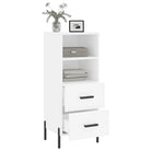 Moderne dressoir met metalen poten en bewerkt hout voor een tijdloze uitstraling - Dressoirs & buffetkasten