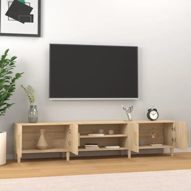 Moderne tv-meubel met bewerkt hout en houten poten voor strak interieur - Tv-meubels