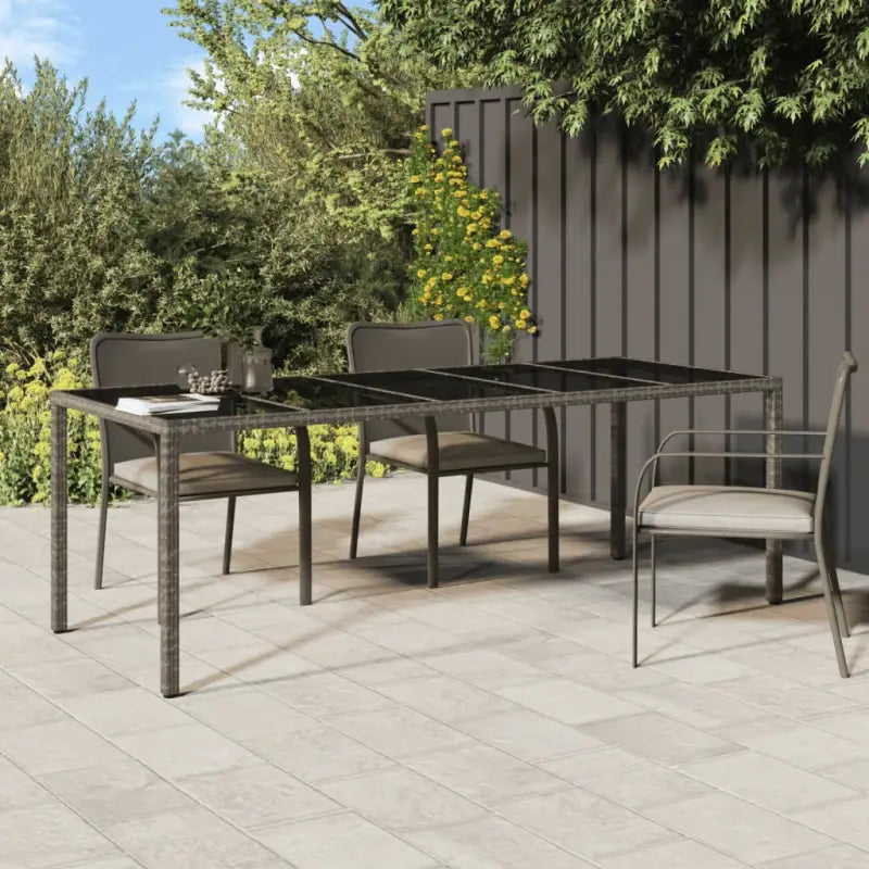 Poly rattan tuintafel met gehard glas voor stijlvolle buitenruimte - Tuintafels