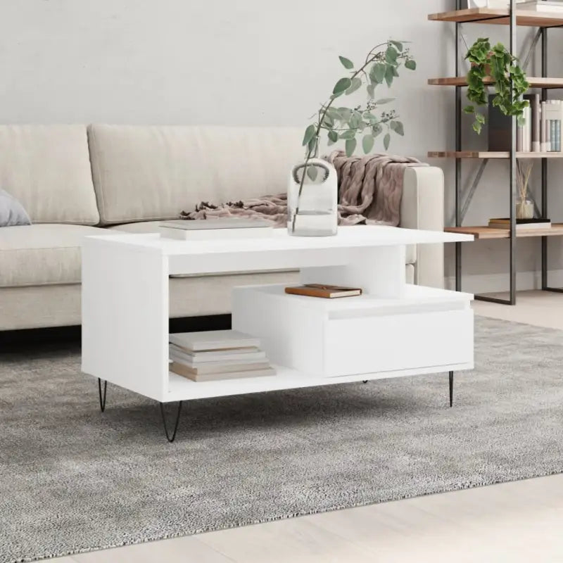 Salontafel met bewerkt hout en metalen poten voor een elegante woonkamer - Salontafels