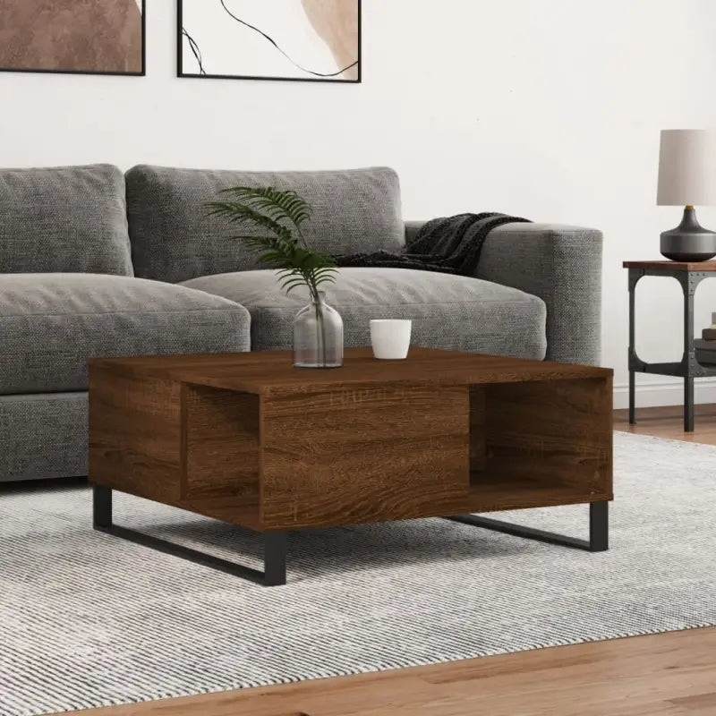 Salontafel met bewerkt hout en metalen poten voor stijlvolle woonruimte - Salontafels