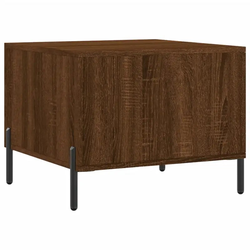 Salontafel met ijzeren poten en bewerkt hout voor een elegante woonkamer - Salontafels