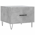 Salontafel met ijzeren poten en bewerkt hout voor een elegante woonkamer - Salontafels