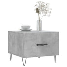 Salontafel met ijzeren poten en bewerkt hout voor een elegante woonkamer - Salontafels