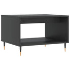 Salontafel met ijzeren poten en bewerkt hout voor elegante woonstijl - Salontafels