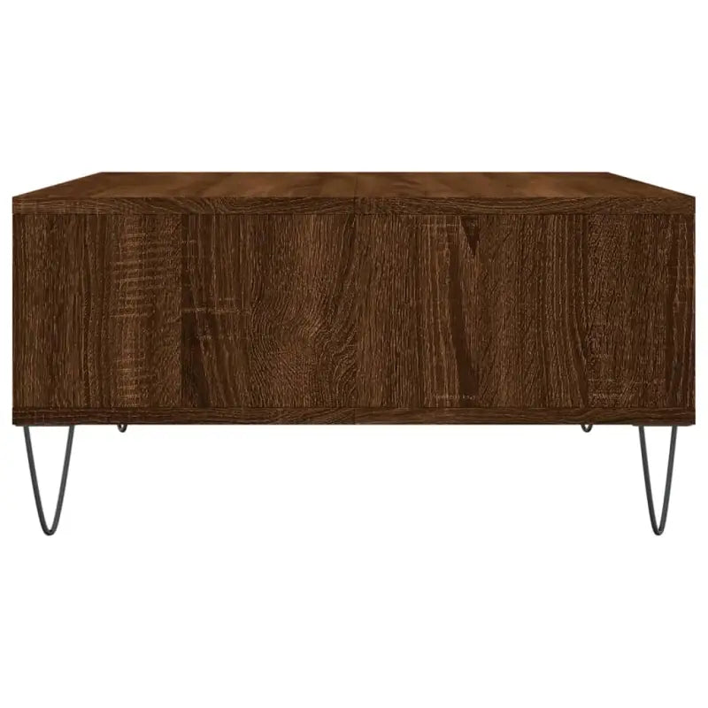 Salontafel van bewerkt hout met stevige ijzeren poten - Salontafels