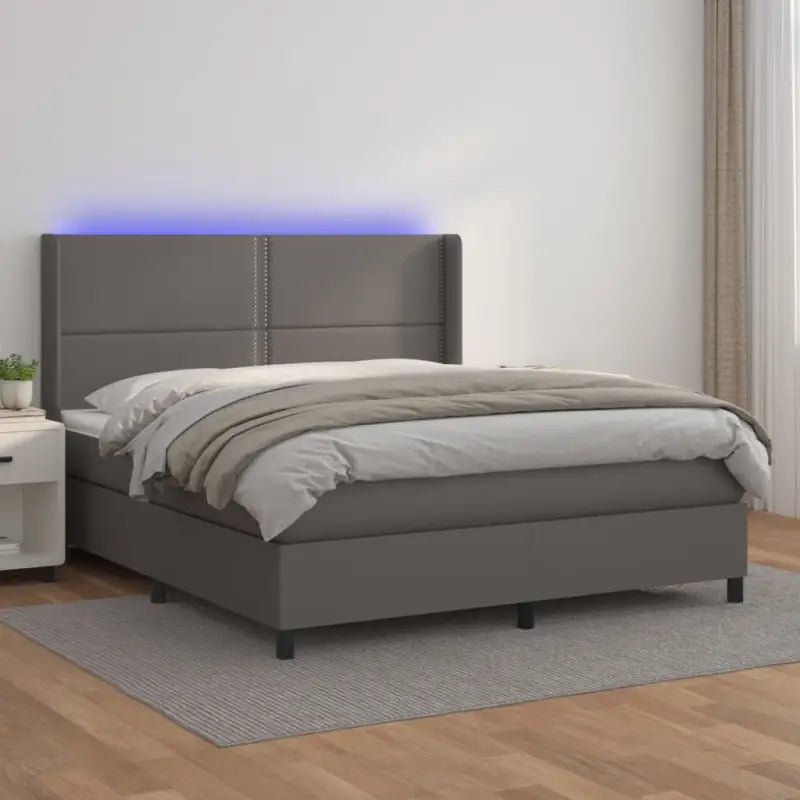 Zwart materialen boxspring met matras en LED voor een rustgevende slaapkamer - Grijs / 180 x 200 cm / Effen