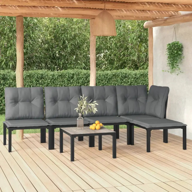 Zwarte tuin loungeset met gepoedercoat staal en weerbestendig PE-rattan - hoek + 3x midden + voetensteun + Tafel